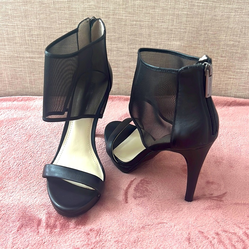 New BCBGeneration Black heels with stylish mesh pattern